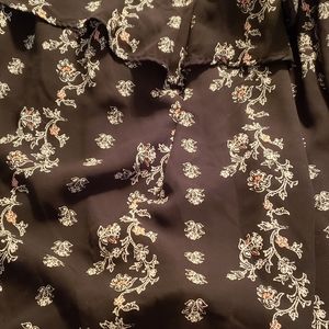 Torrid floral black top, size 6